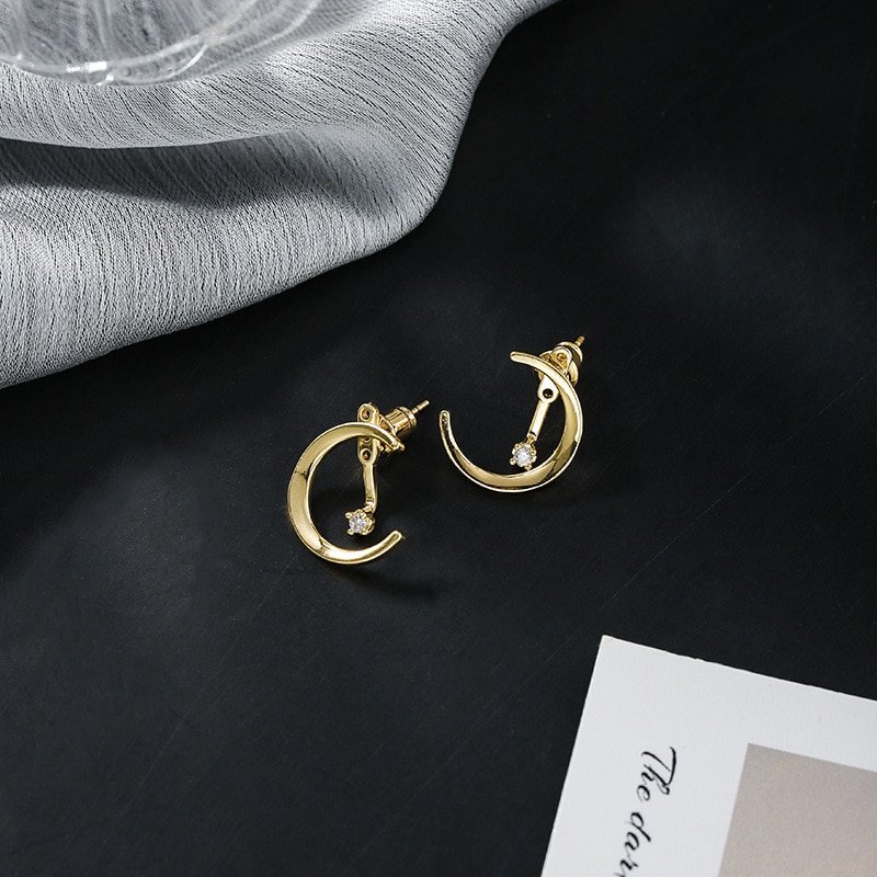 Closeup of the North Star Moon Ear Jackets in Gold.