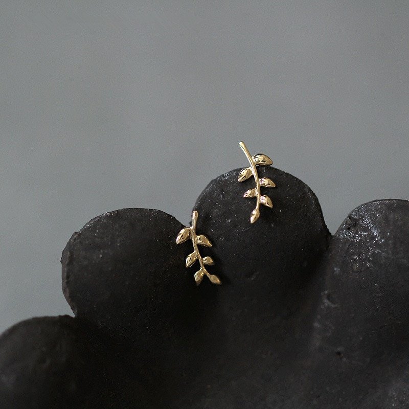Closeup of Olive Branch Studs.