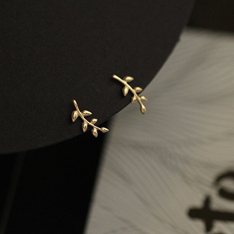 Closeup of the Olive Branch Stud earrings.