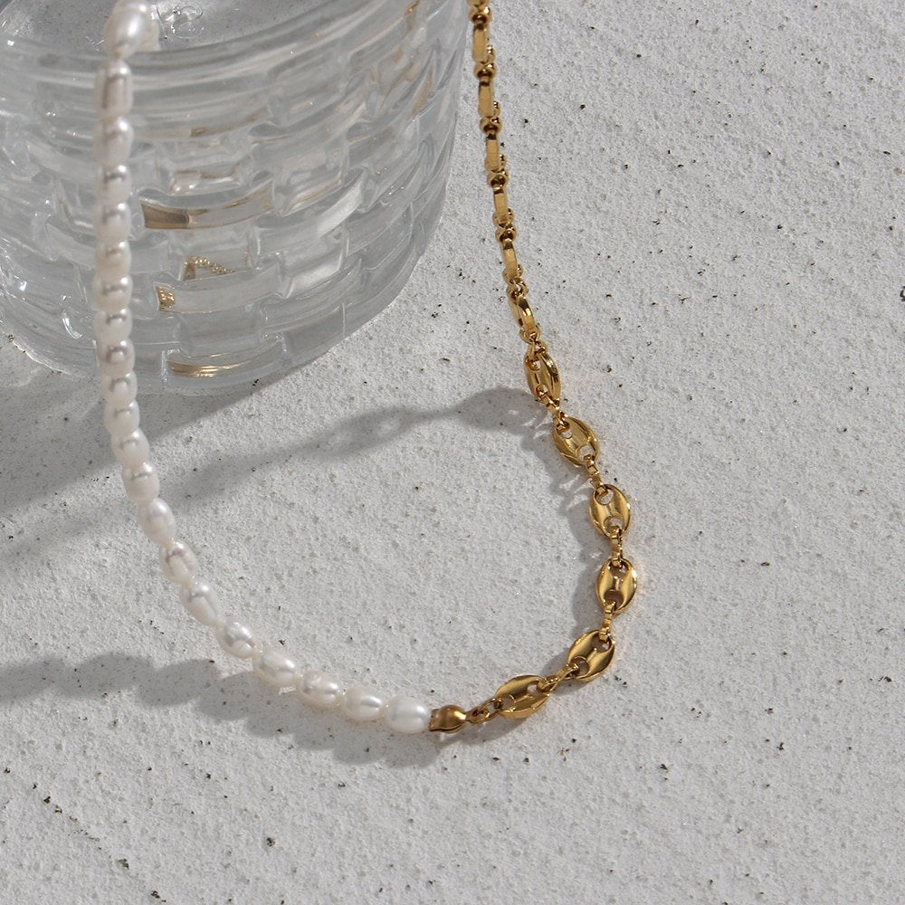 Closeup of the Pearl Anchor Chain Necklace.