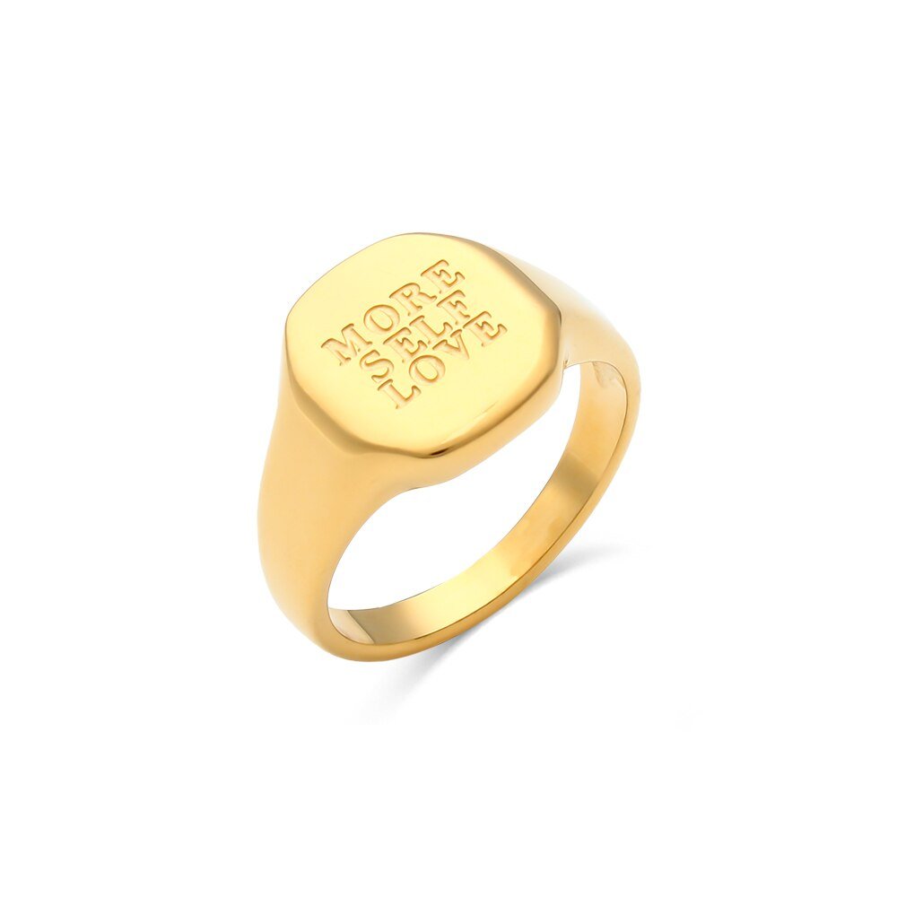 "More Self Love" engraved gold signet ring.