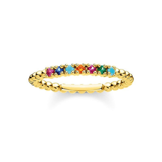 A gold stacking ring with a beaded texture and colorful CZ stones.