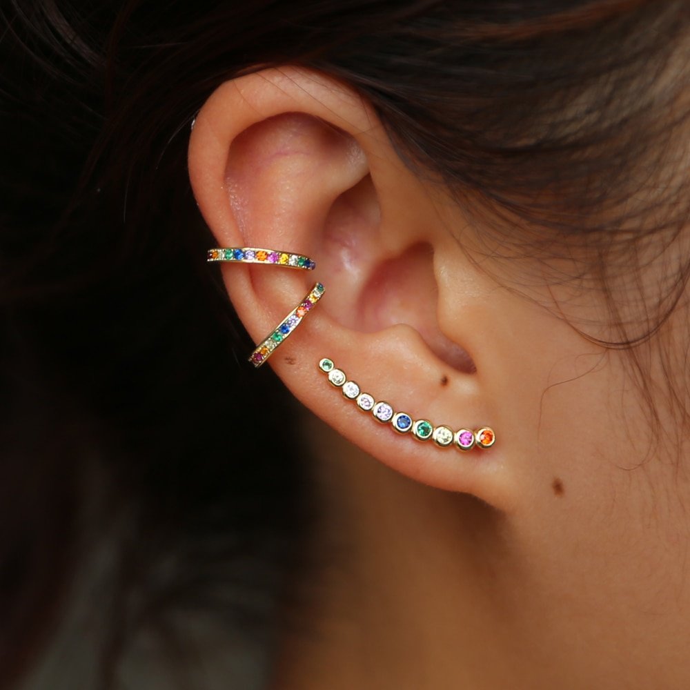 A model wearing two Rainbow Zirconia Ear Cuffs.