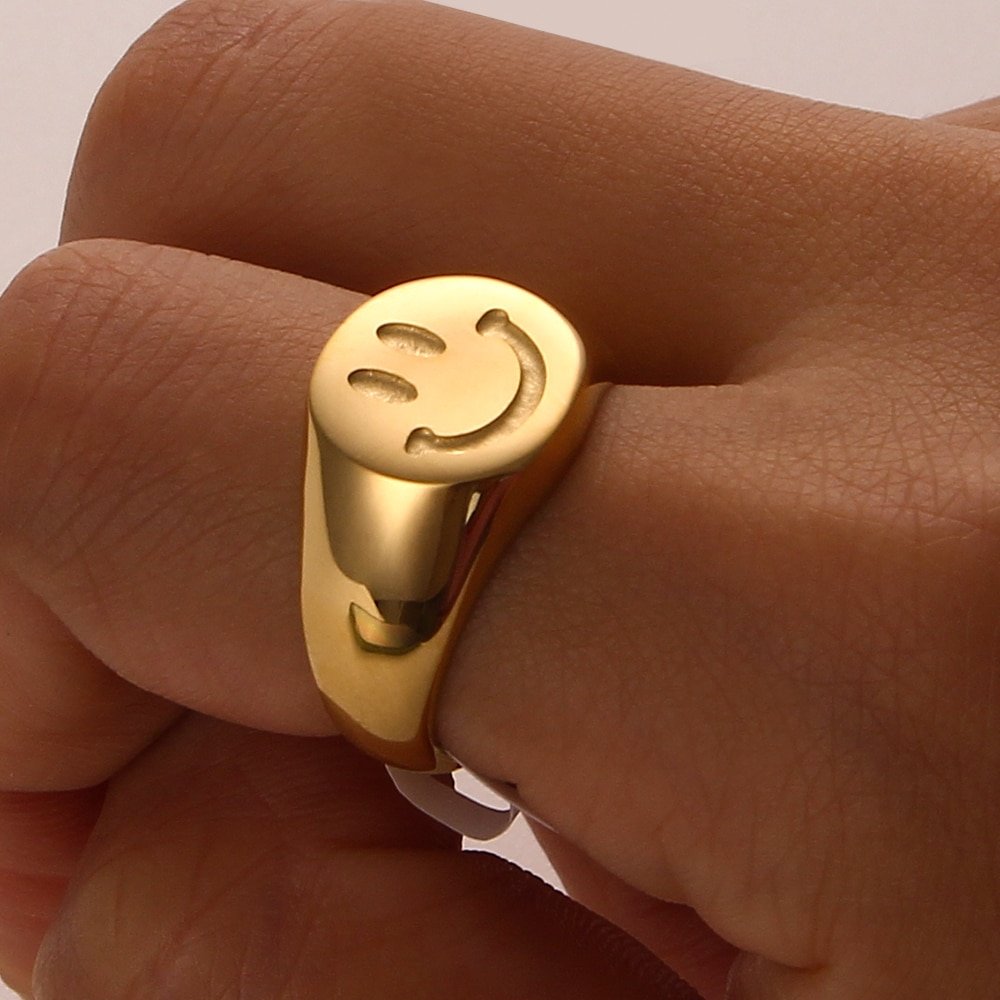 A model wearing the Smiley Signet Ring.