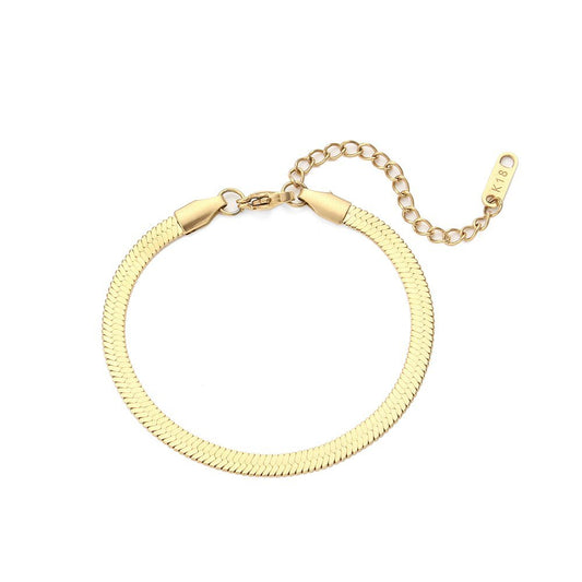 Gold snake chain bracelet.