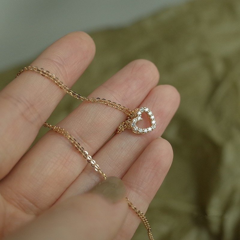 Tiny heart CZ pendant necklace.