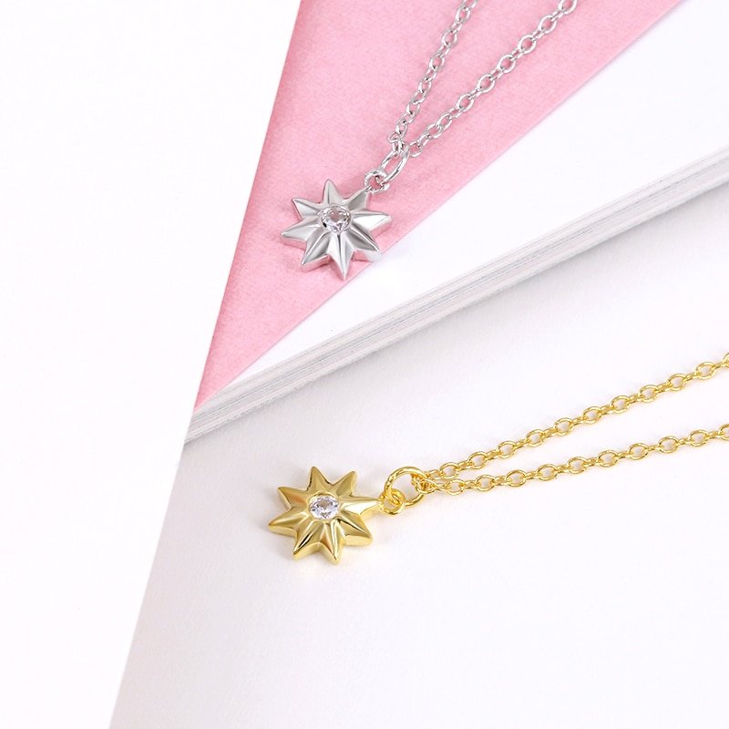 Closeup of the gold and silver Star CZ Necklace.