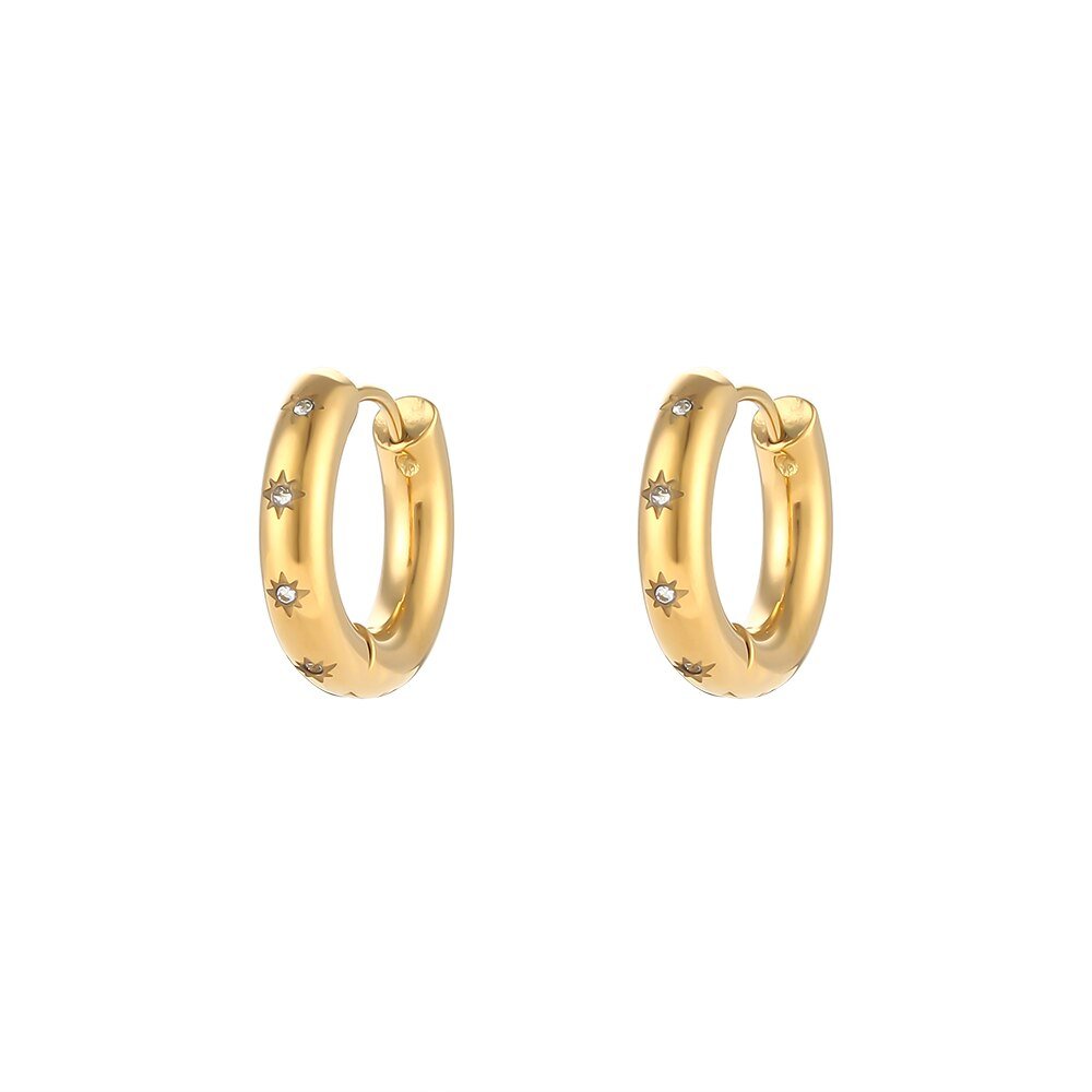 Gold chunky hoops with star engravings.