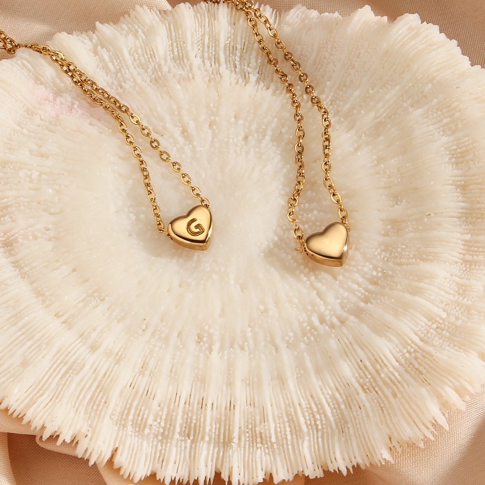 Front and back view of the gold Sweetheart Initial Necklace.