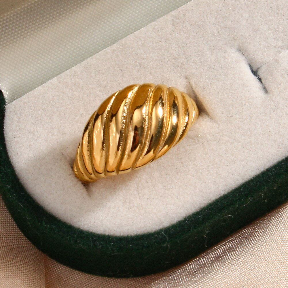 Closeup of the Swirl Croissant Gold Ring.