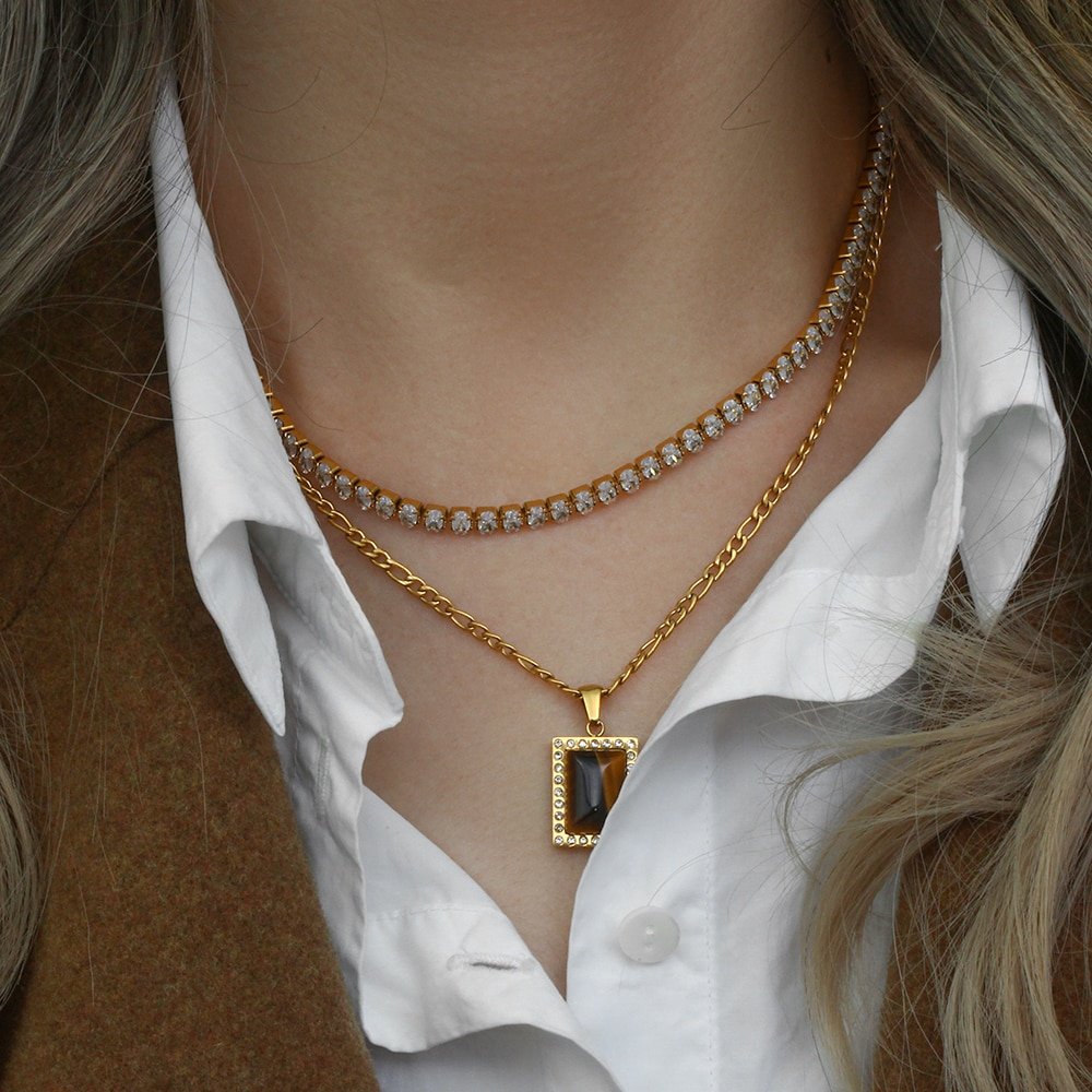 A model wearing the Tiger's Eye Rectangle Gold Necklace.