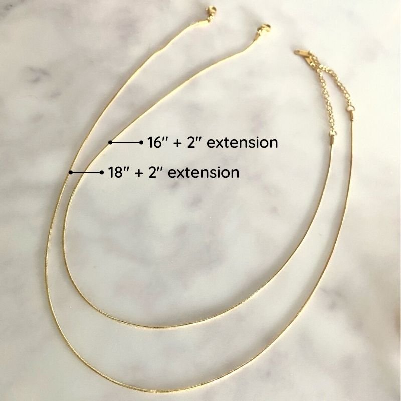 Thin gold necklaces in two lengths. 