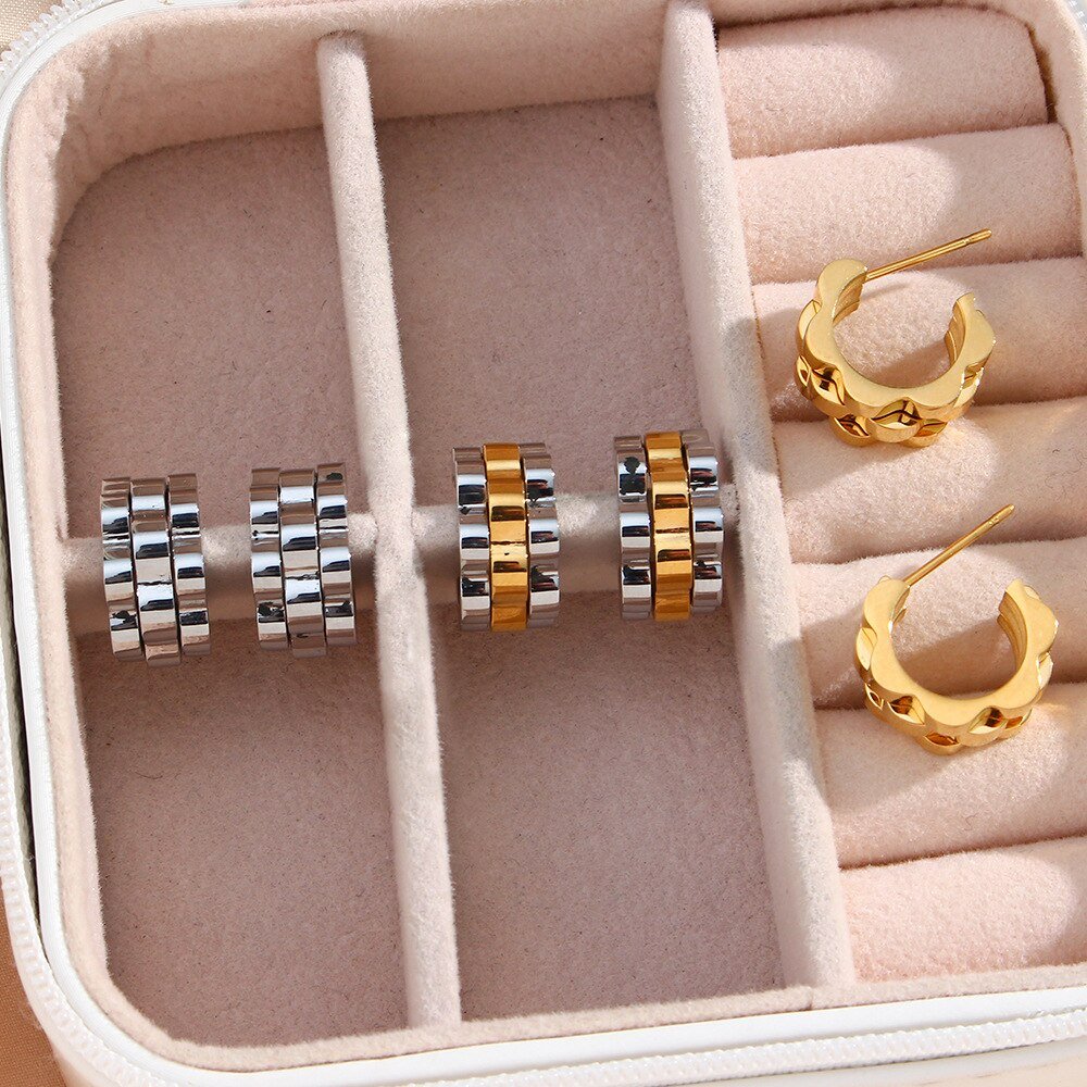 Chunky hoop earrings in a watch band link design.