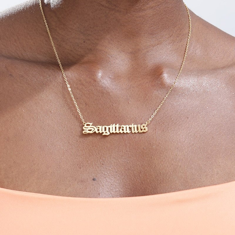 A model wearing a Sagittarius necklace.